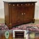 Empire buffet from the early 19th century in mahogany with a black marble top.