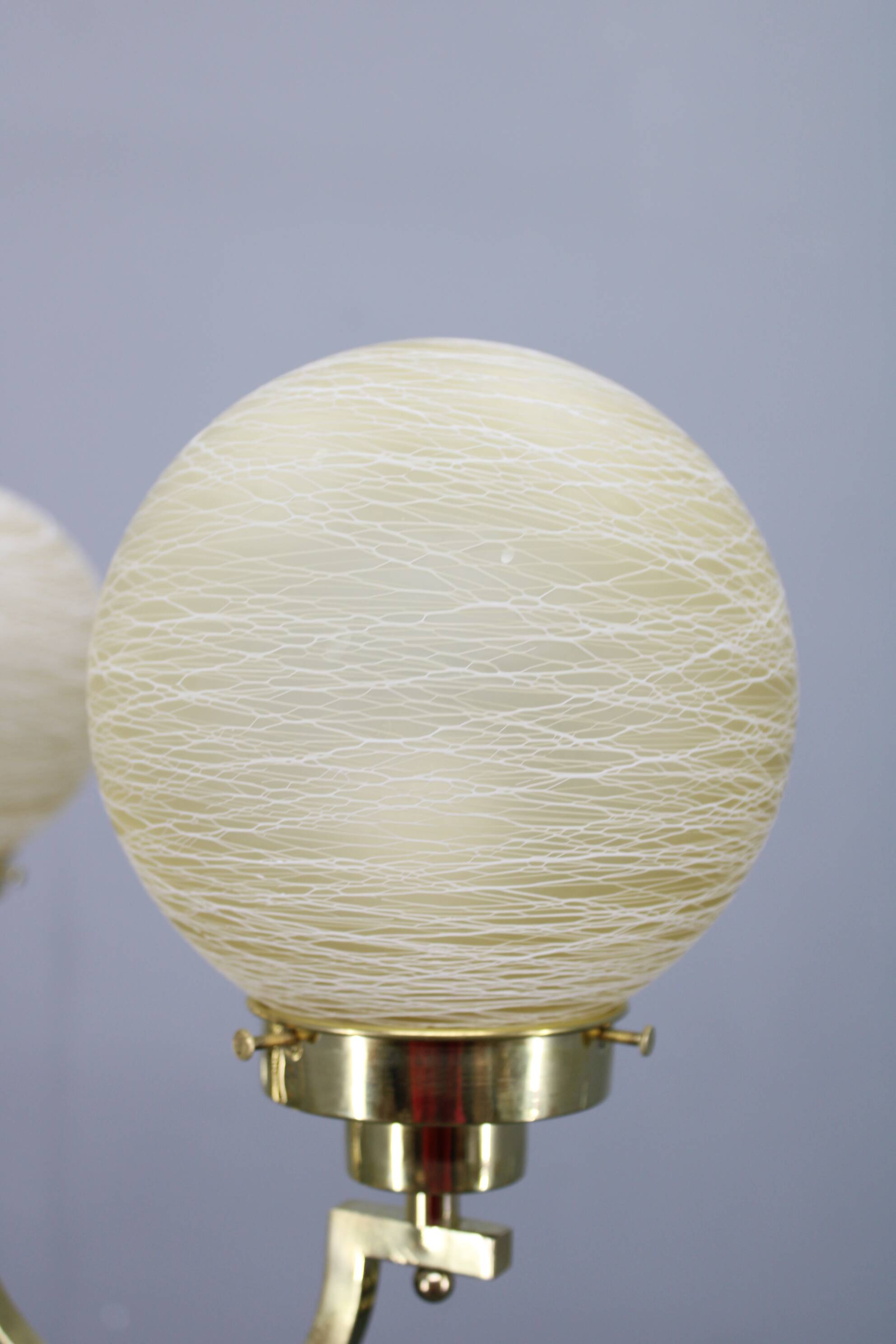 1930s Art Deco brass chandelier with textured glass globes, Czechoslovakia