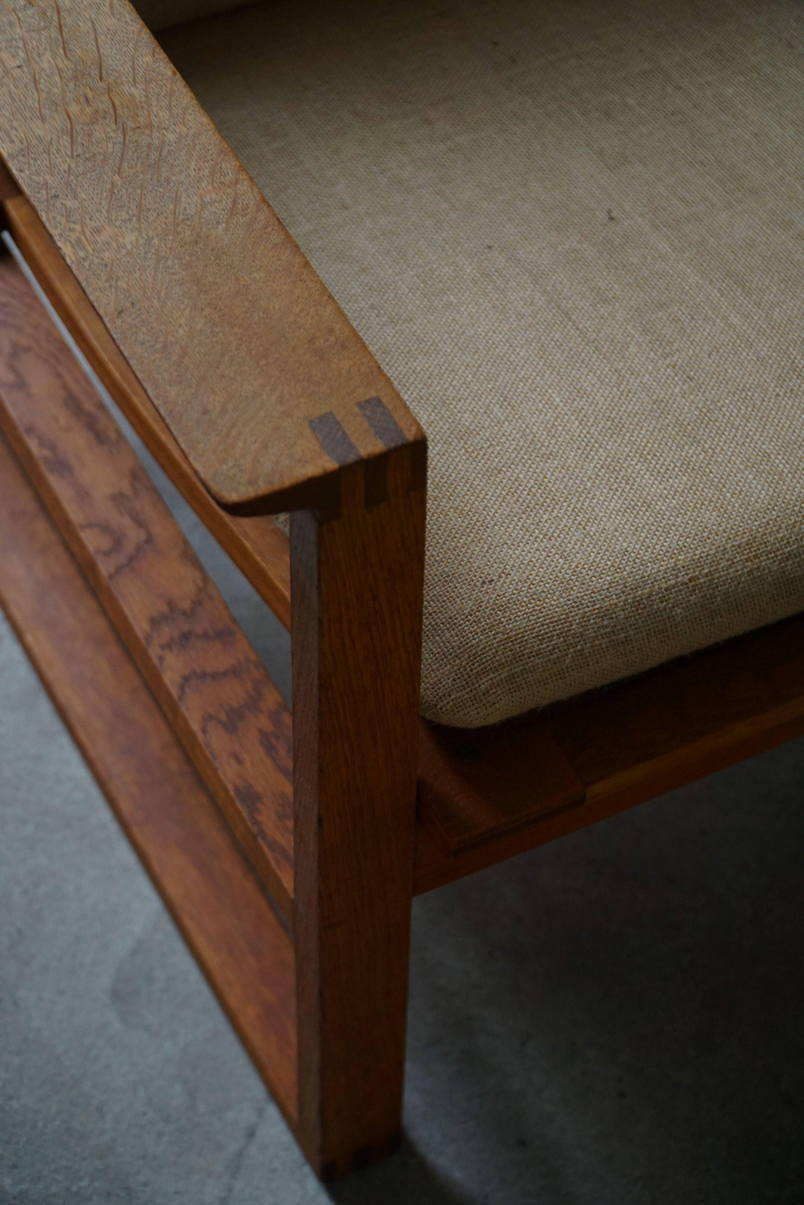 Børge Mogensen, a pair of BM2256 lounge chairs in oak and jute, Denmark, 1960s.