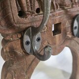 Coat rack with 2 hooks on a frieze of divinities in teak