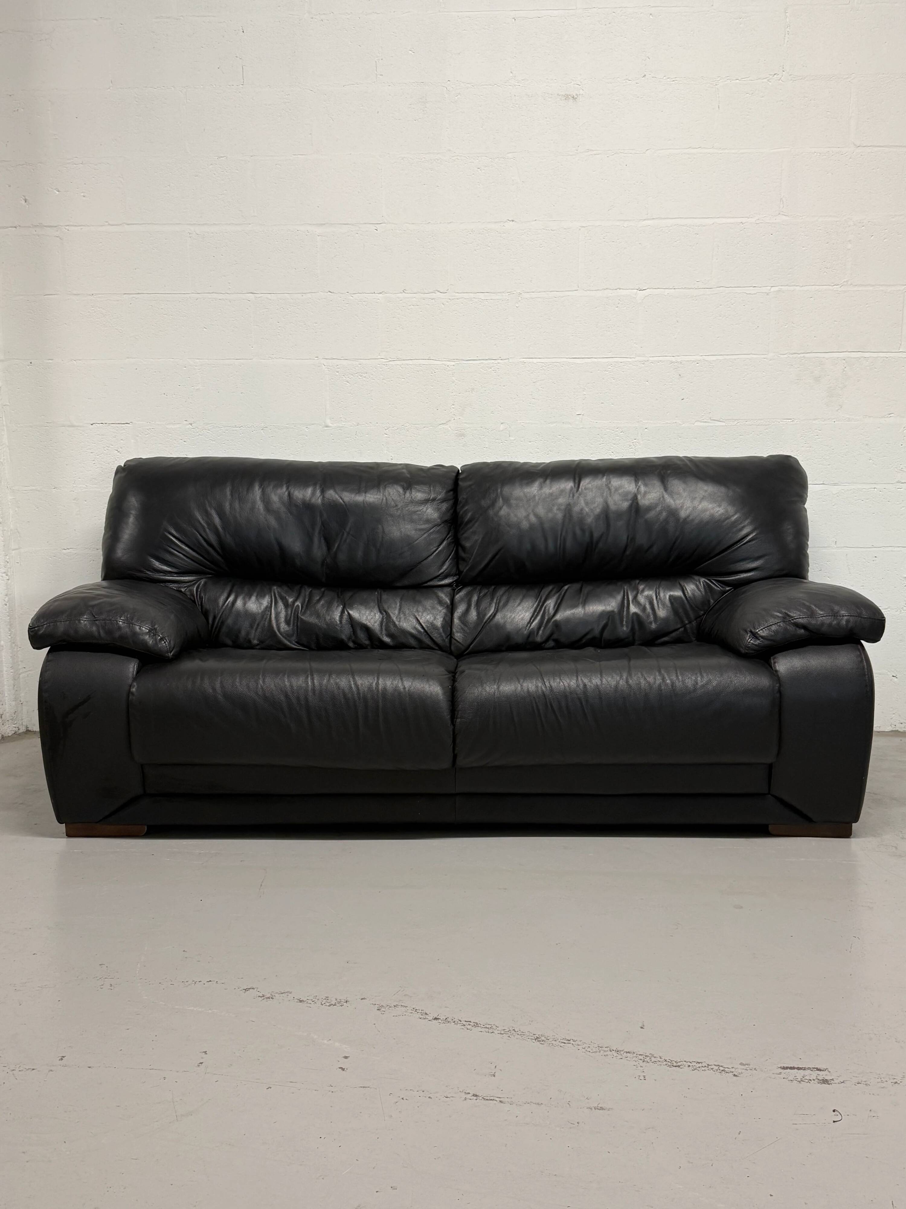 Black leather sofa — Italian postmodern design
