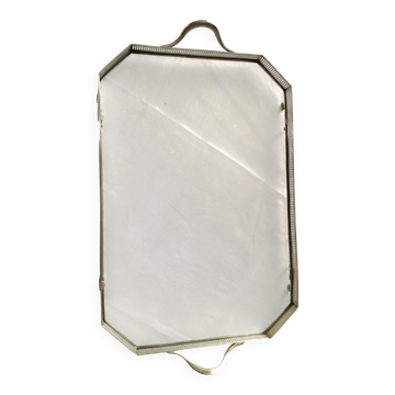 Important silver-plated metal plateau with a glass base.