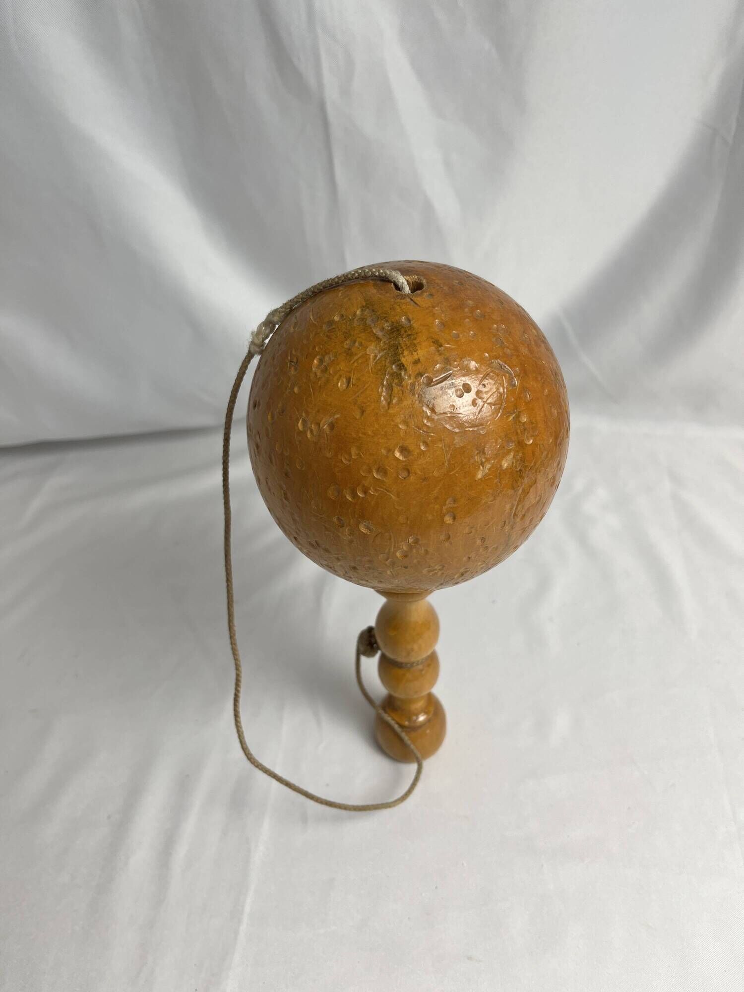 Old bilboquet toy in varnished wood 20th century