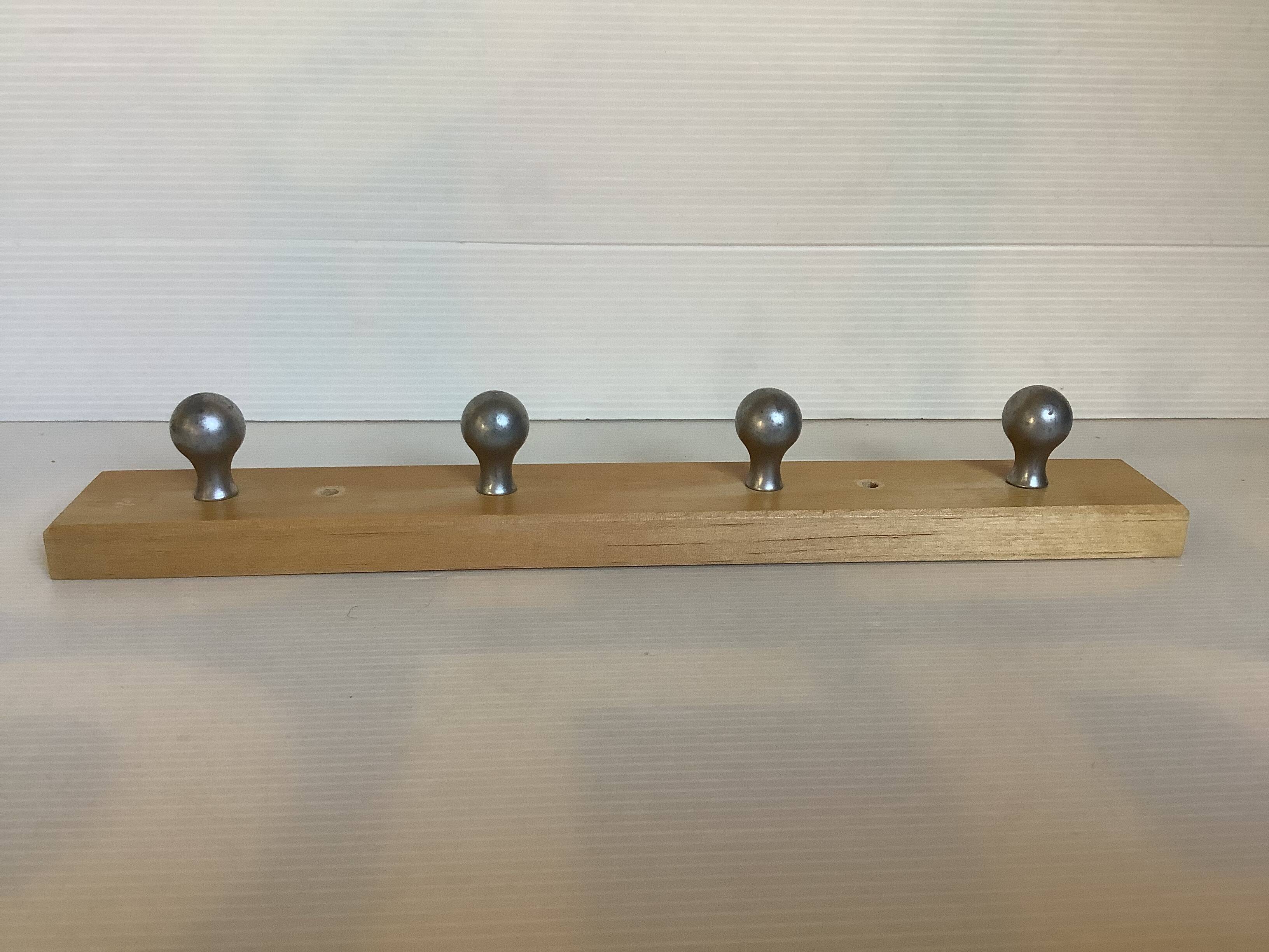 Wooden metal ball tea towel holder