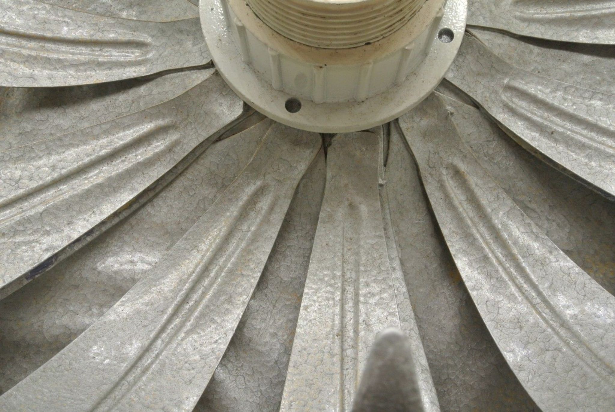 Silver-coloured metal flower shape wall sconce