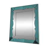 Turquoise green mirror in Hollywood Regency style