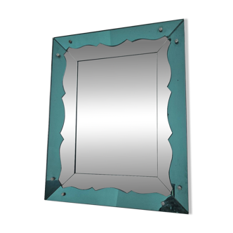 Turquoise green mirror in Hollywood Regency style