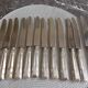 12 silver-plated art deco knives