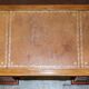 Vintage walnut desk with a leather top and two drawers.