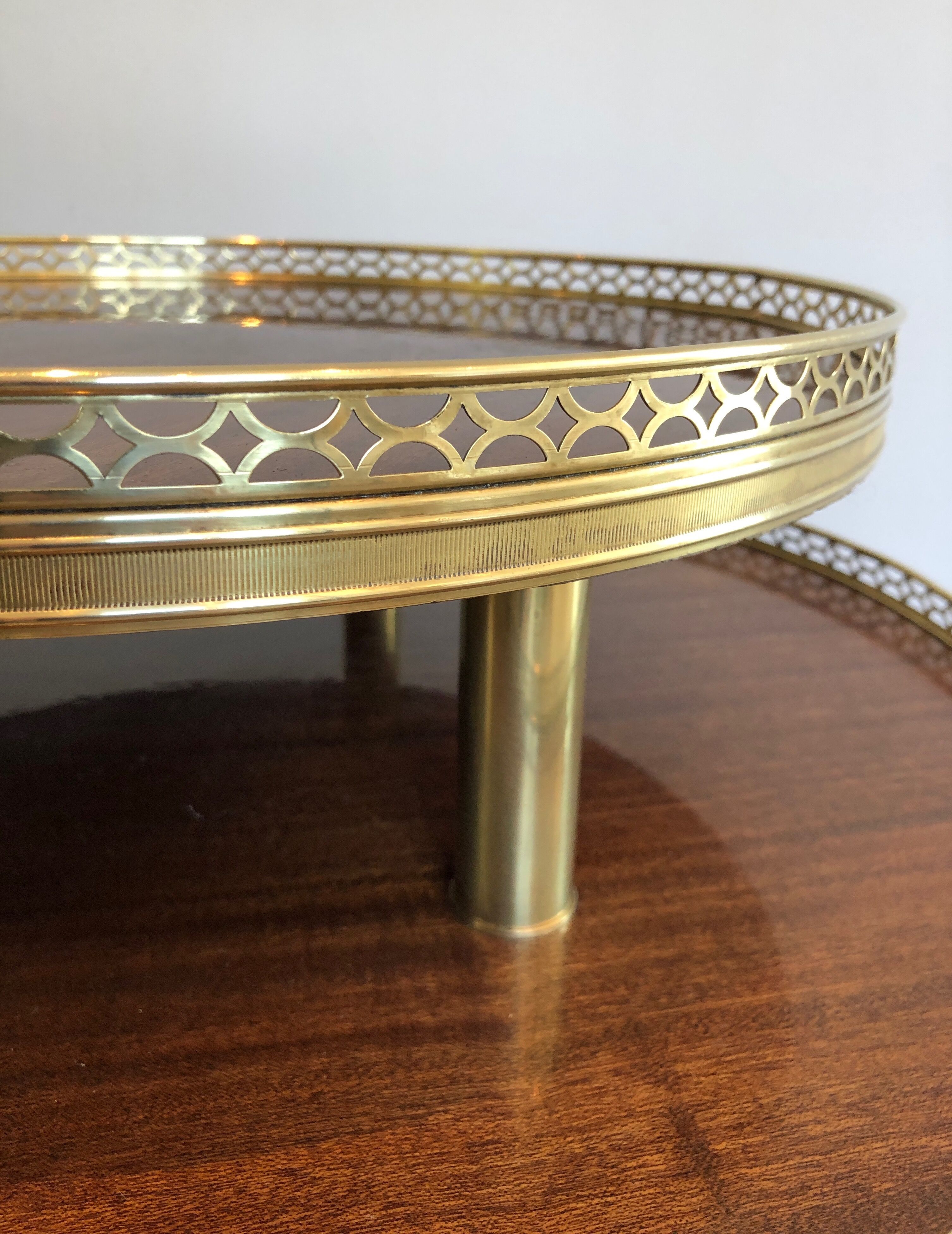 Neoclassical style tripod pedestal in mahogany, brass