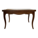 Extendable dining table in Louis XV style made of wood.
