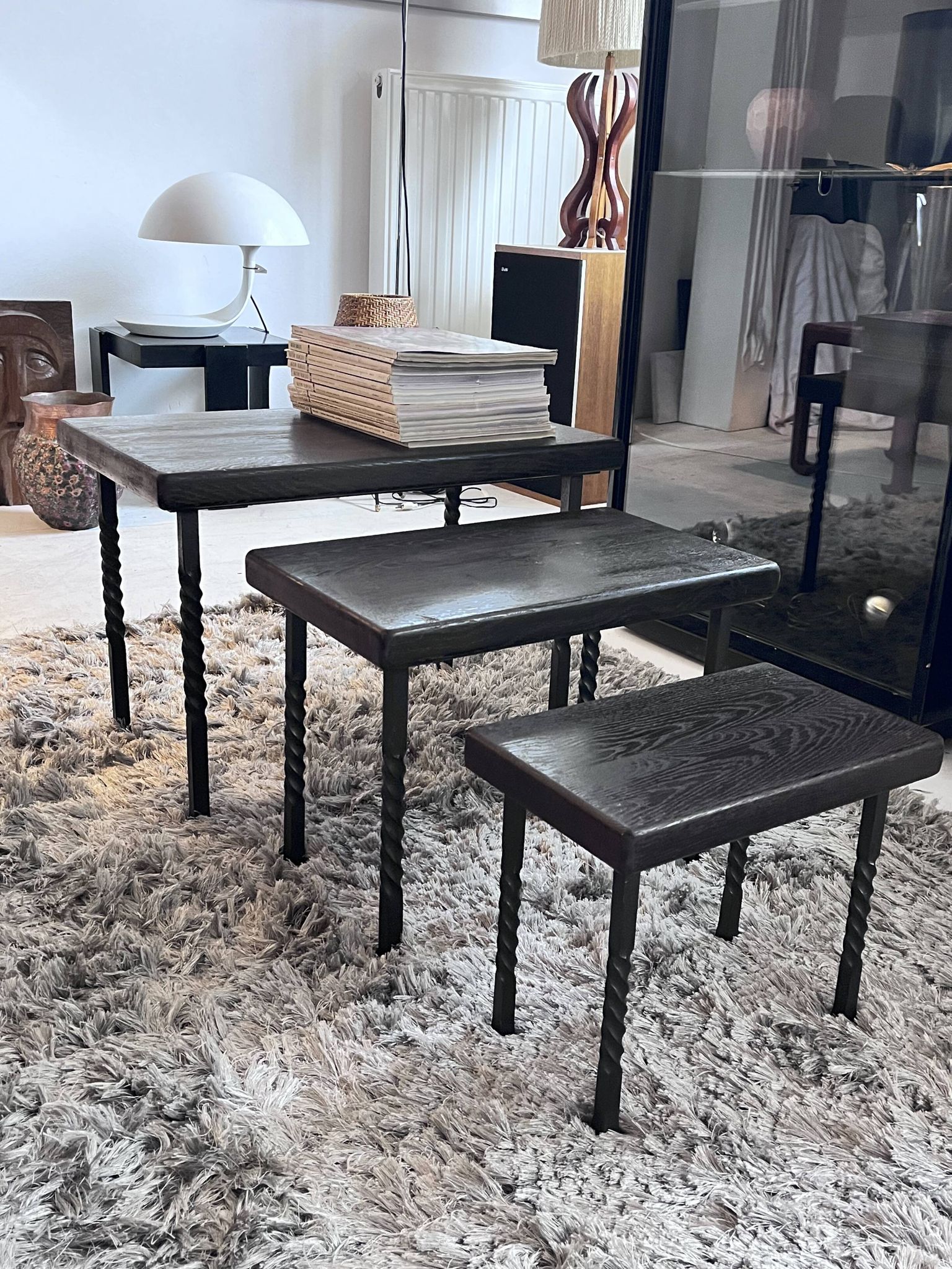 Brutalist nesting table in ebonized oak and wrought iron