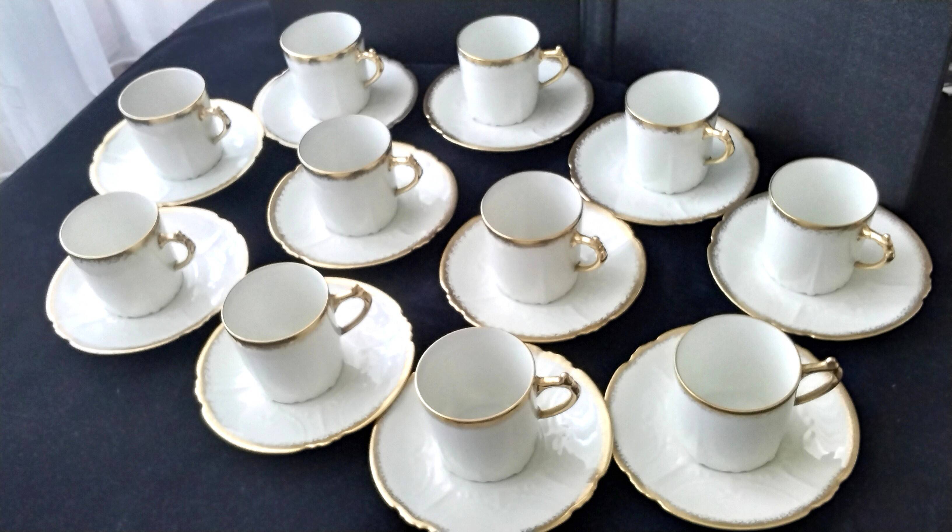 11 coffee cups in litre shape made of Limoges porcelain