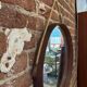 Vintage round teak mirror