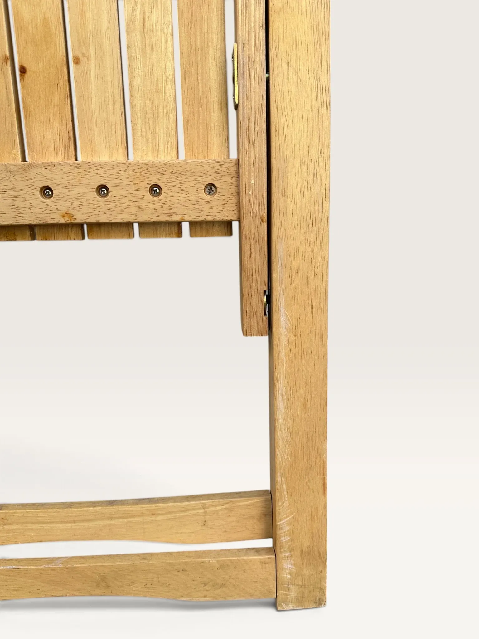Blonde wooden folding chair in the style of Aldo Jacober.