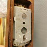 Two smaller wall lamps, made of crystal, rosewood hanging with brass colored details