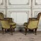 Pair of louis xv style armchairs in carved beech around 1920