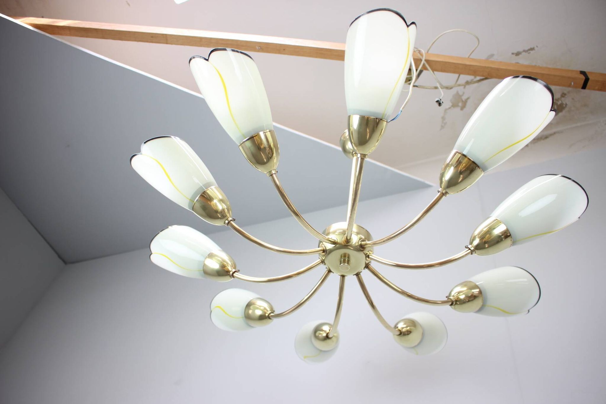 Brass and glass ten-arm chandelier from the mid-century, 1960s.
