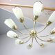 Brass and glass ten-arm chandelier from the mid-century, 1960s.