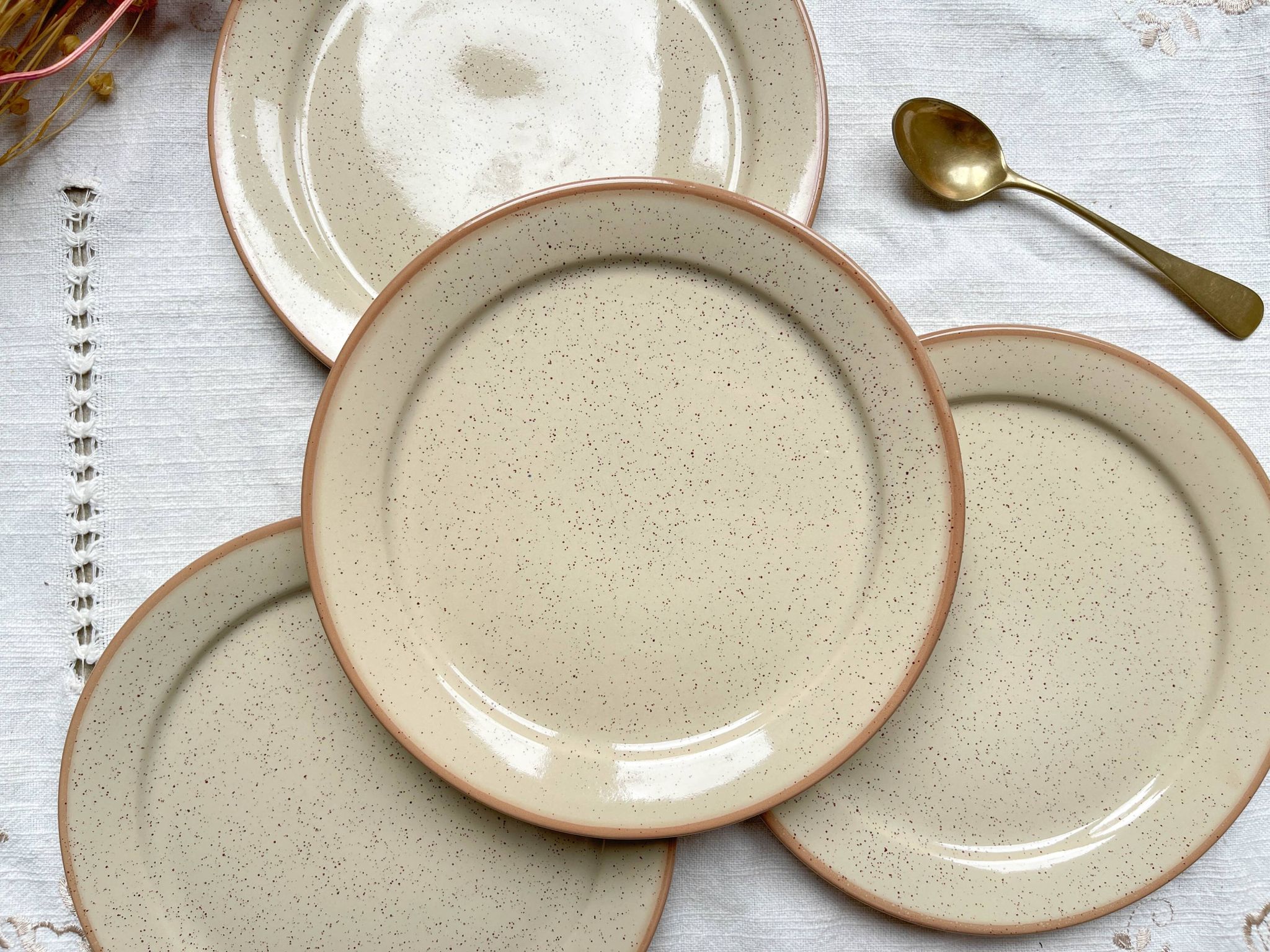 4 Small plates in speckled stoneware, Tulowice style, mid-century, 20th century
