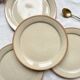 4 Small plates in speckled stoneware, Tulowice style, mid-century, 20th century