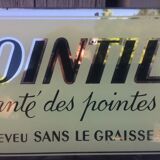 Plate fixed under advertising glass