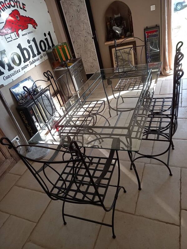 Table en verre et chaises fer forgé