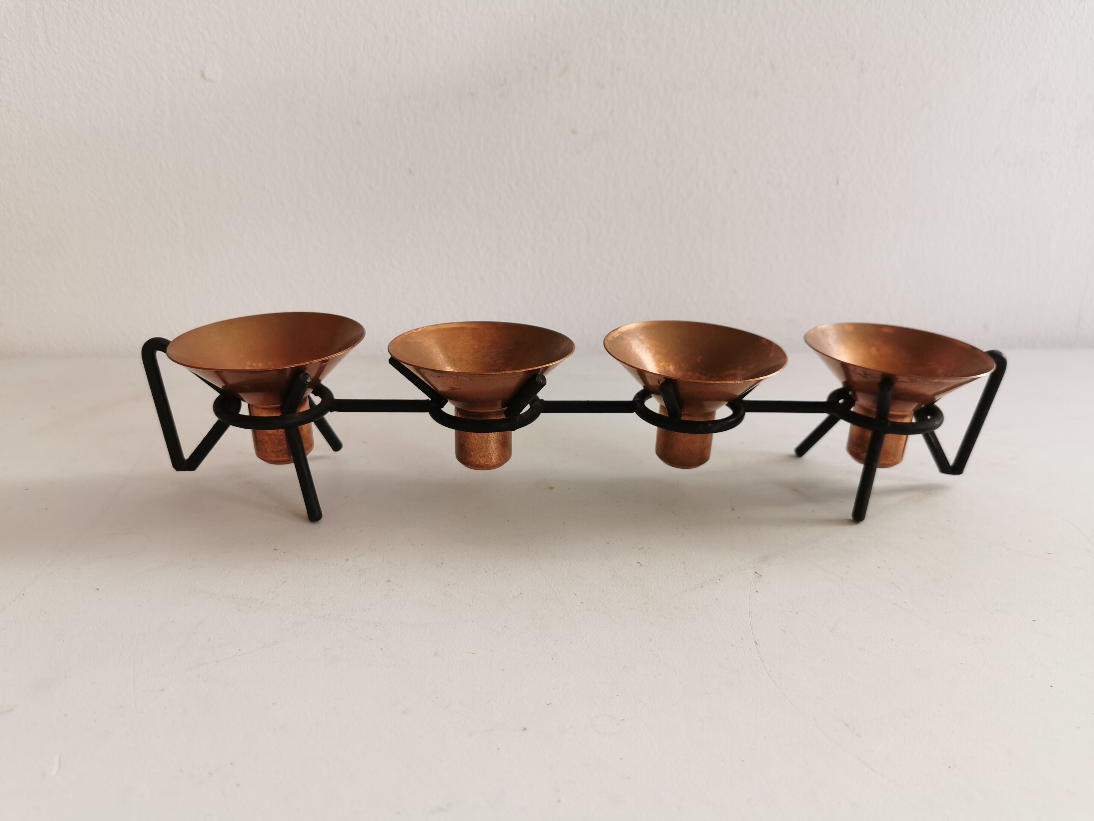 Older Danish designed candlestick, made of cast iron and copper.