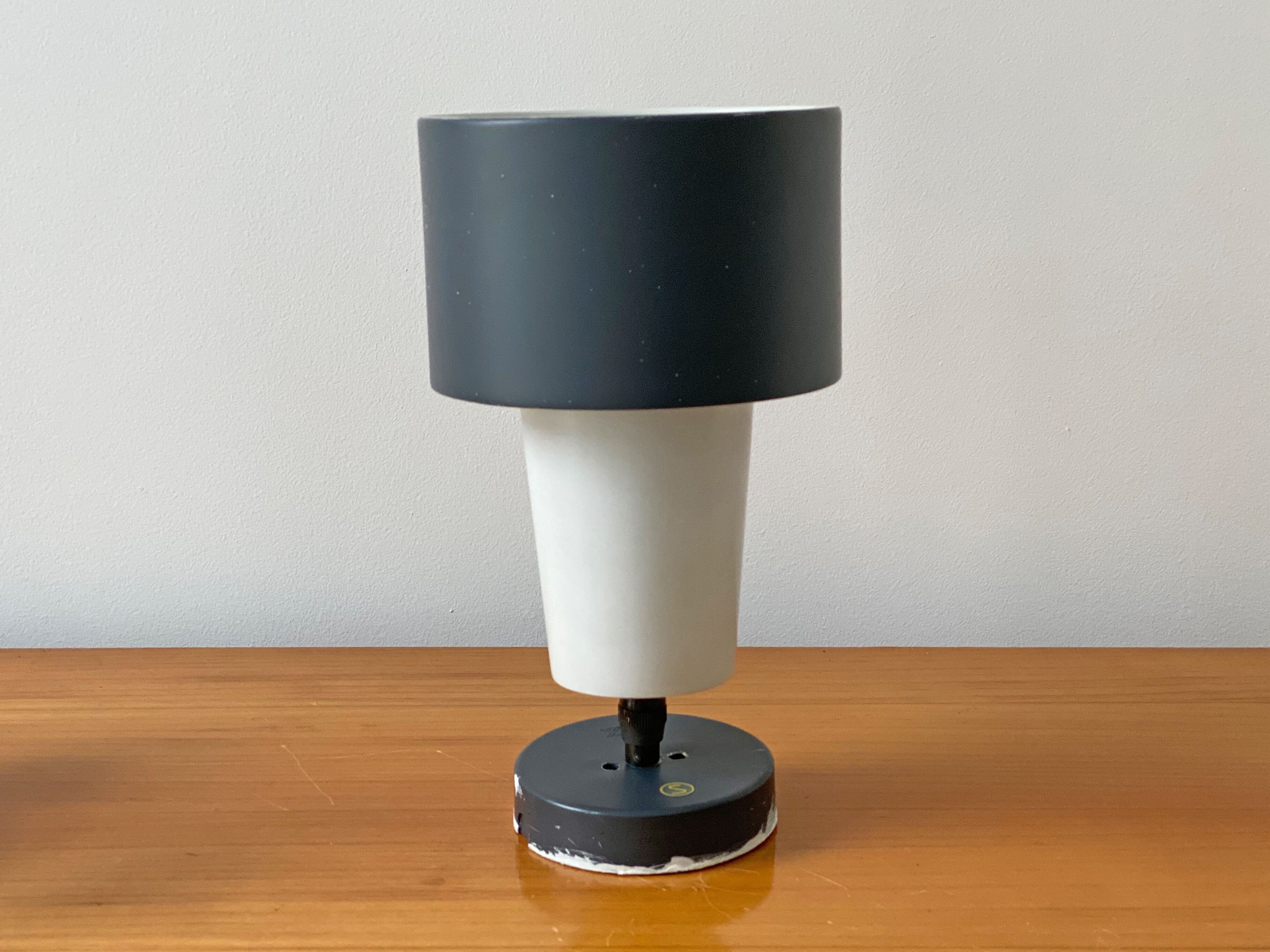 Exaktor spot wall sconce