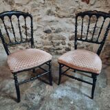 Pair of antique Napoleon III chairs in blackened wood and fabric