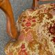 Louis XV armchair in carved solid wood and red and yellow fabric
