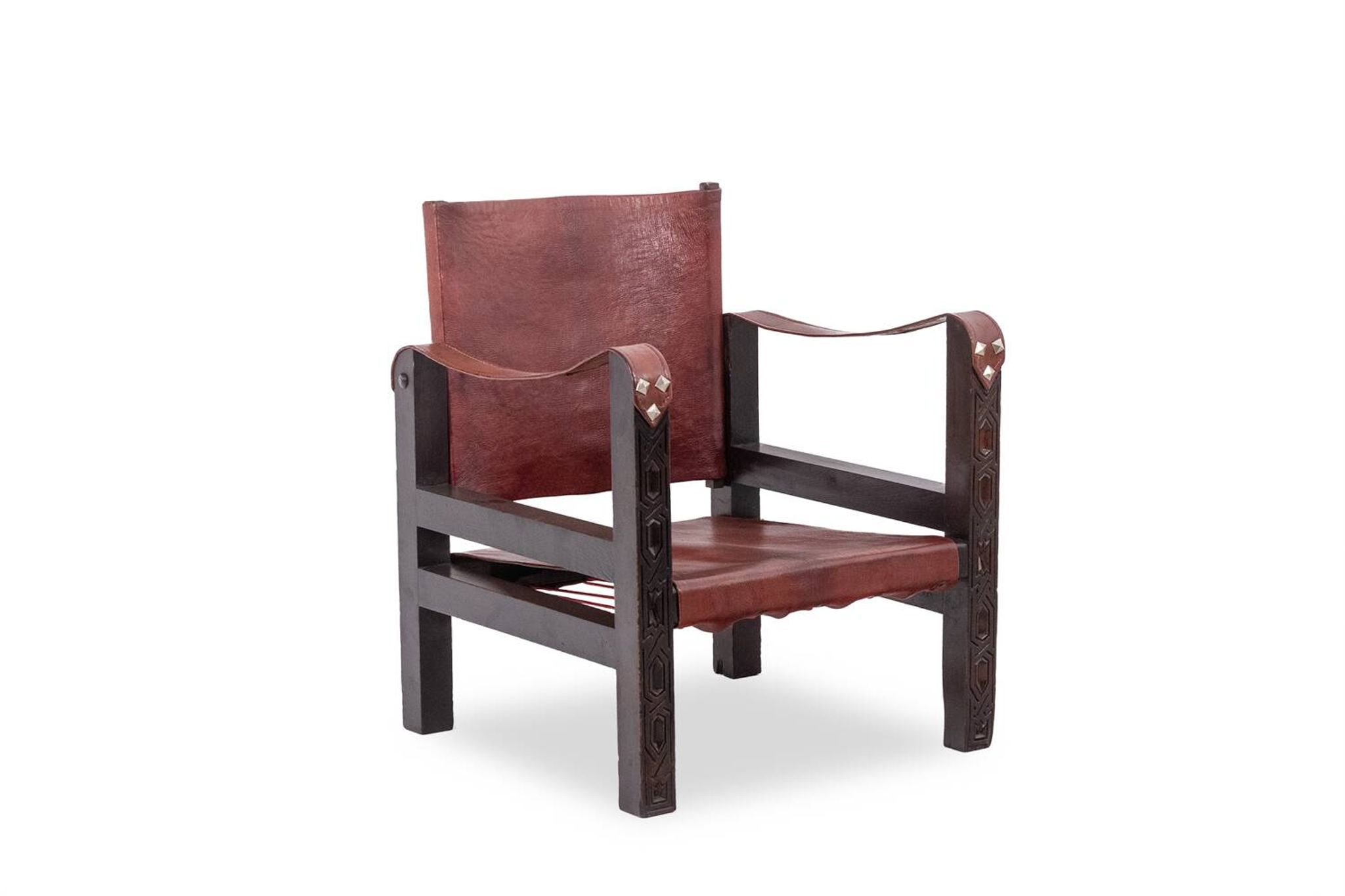 “Safari” armchair in wood and cognac leather. 1960s/70s.
