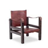 “Safari” armchair in wood and cognac leather. 1960s/70s.