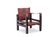 “Safari” armchair in wood and cognac leather. 1960s/70s.