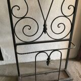 Wrought iron coat rack and shelf