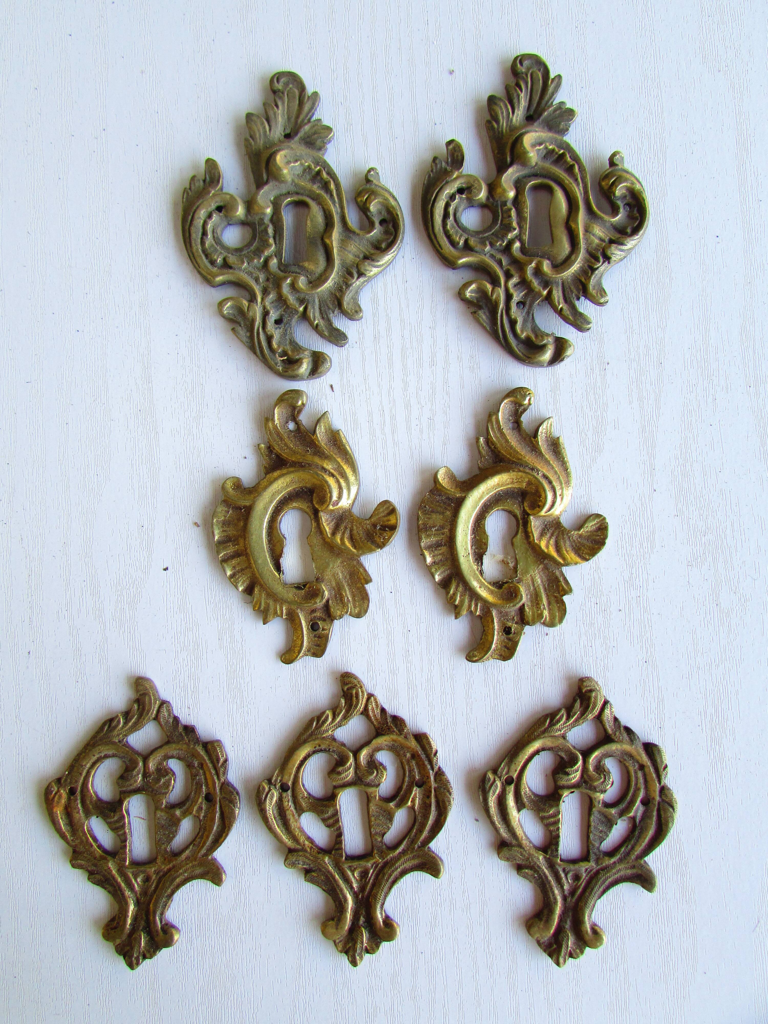 Set of 7 bronze lock entries, for antique furniture