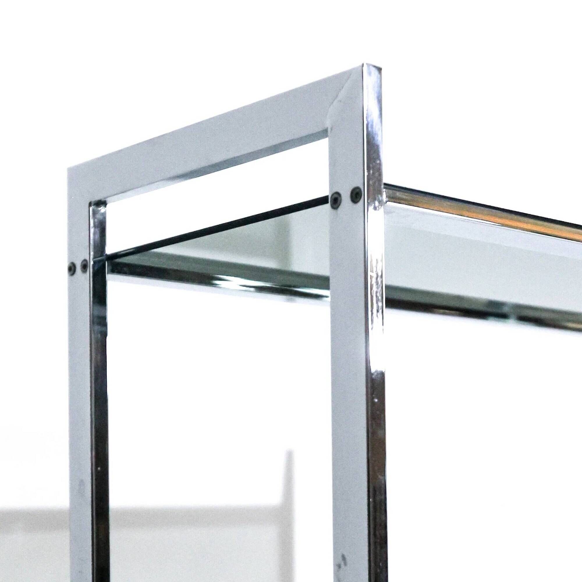 Vintage Italian freestanding shelf in chrome with glass shelves, 1970s.
