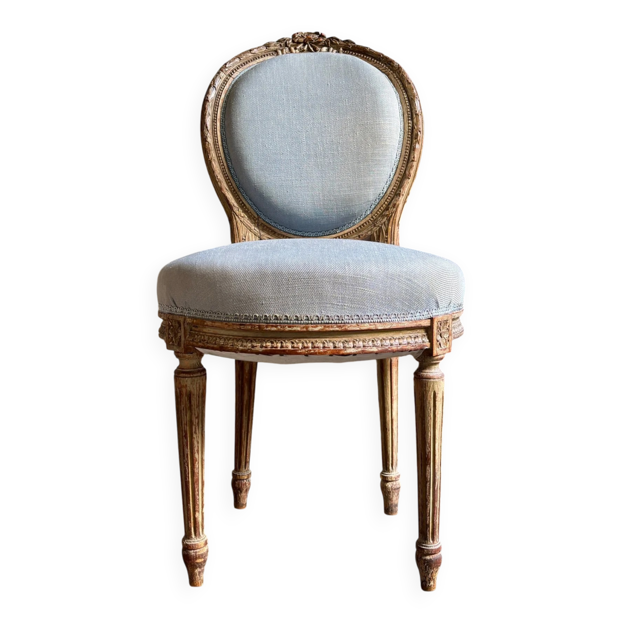 Medallion back chair in reclaimed wood and blue cotton.
