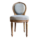 Medallion back chair in reclaimed wood and blue cotton.