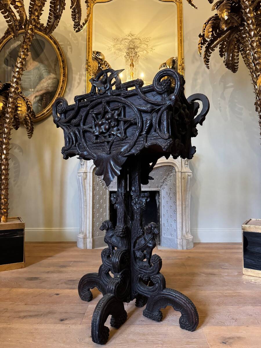 Carved wooden jardinière, Black Forest work, 19th century.