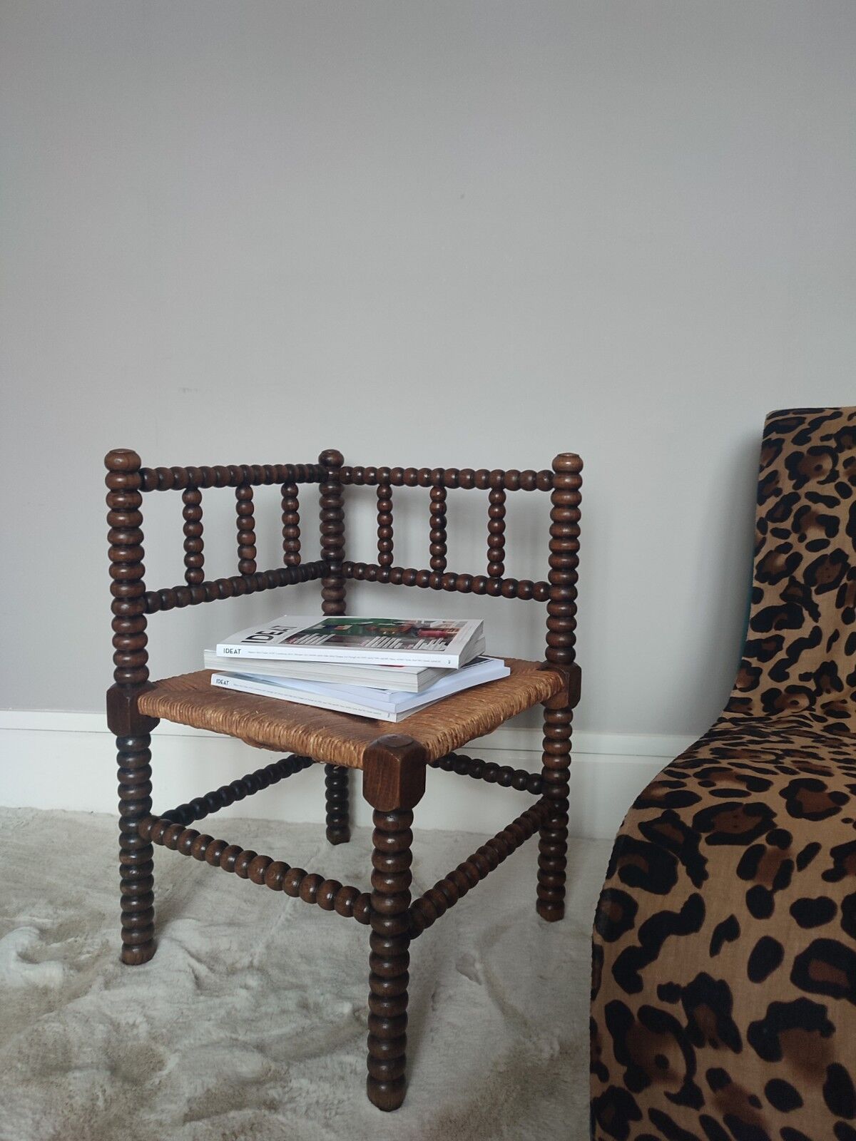 Turned wooden corner chair