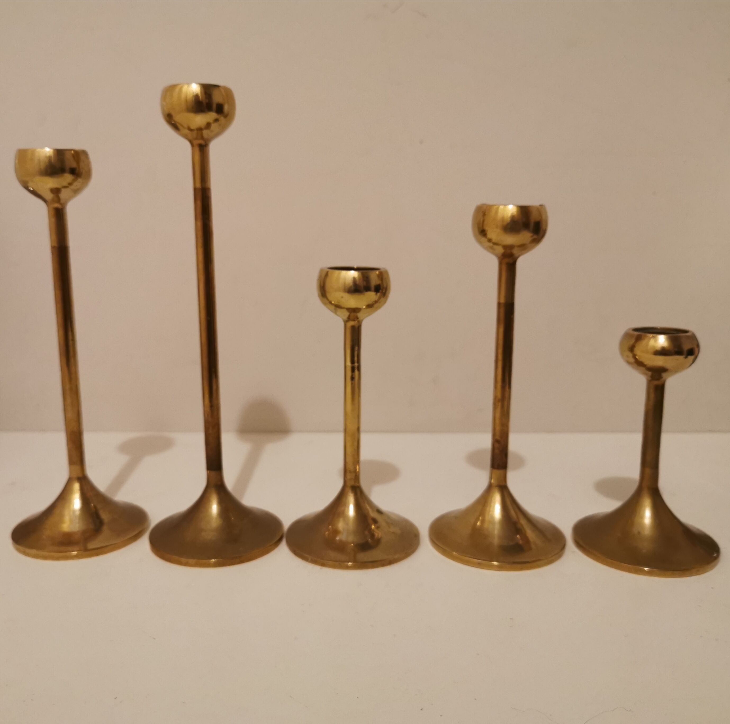 Set of 5 brass candlesticks from the 70s