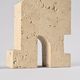 Pair of stylised cats in travertine, Fratelli Manelli, Italy, circa 1970.