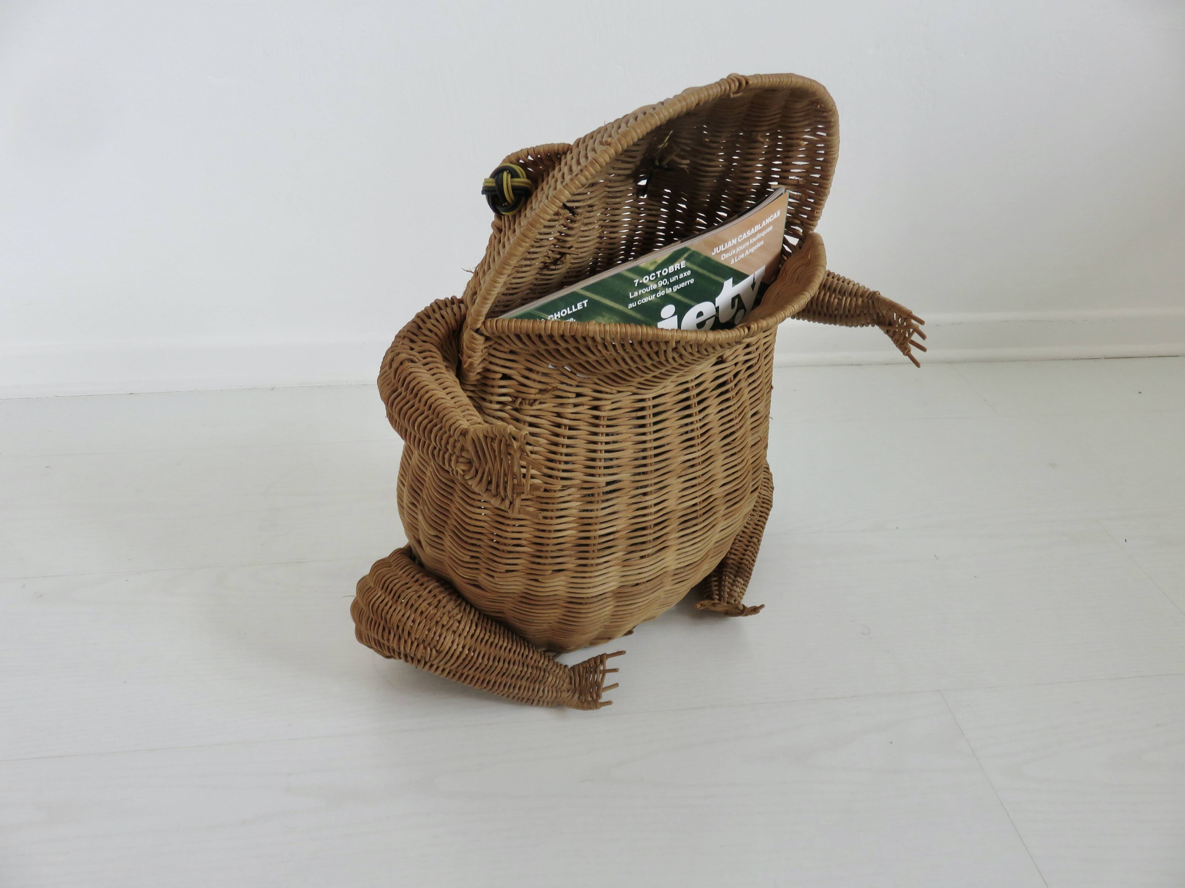 Magazine rack, design by Olivier Cajan, in wicker rattan, 1970s.