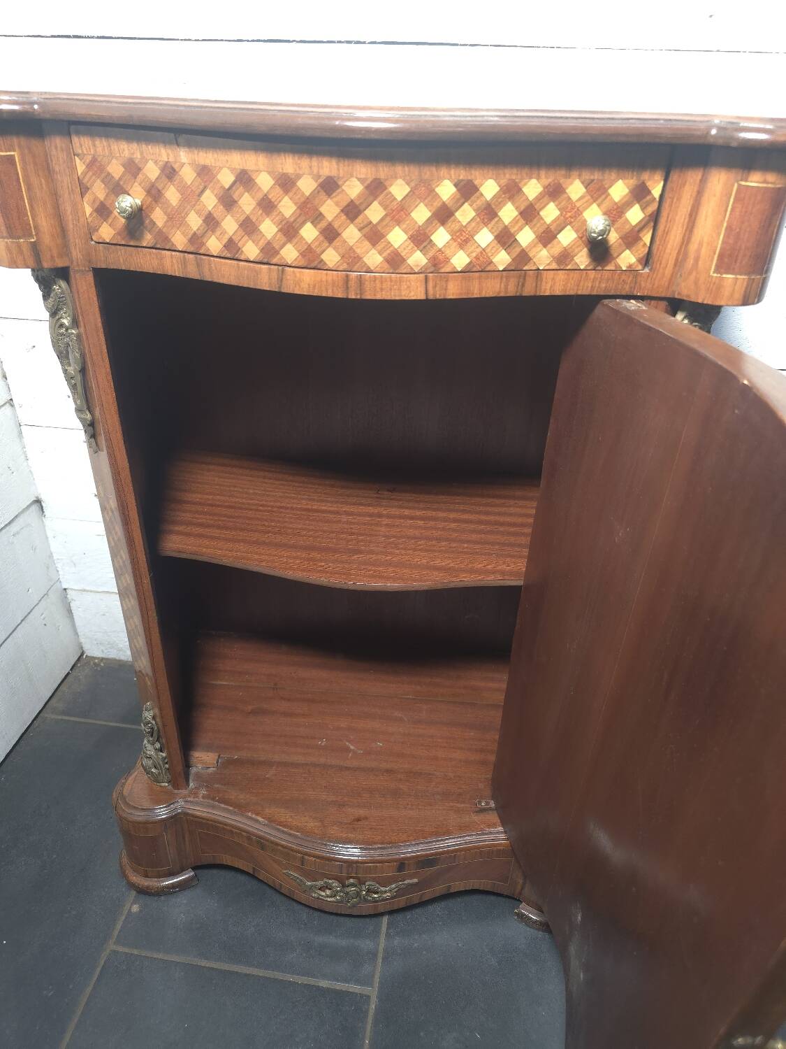 Small support table in Louis XV style with marquetry and bronze.