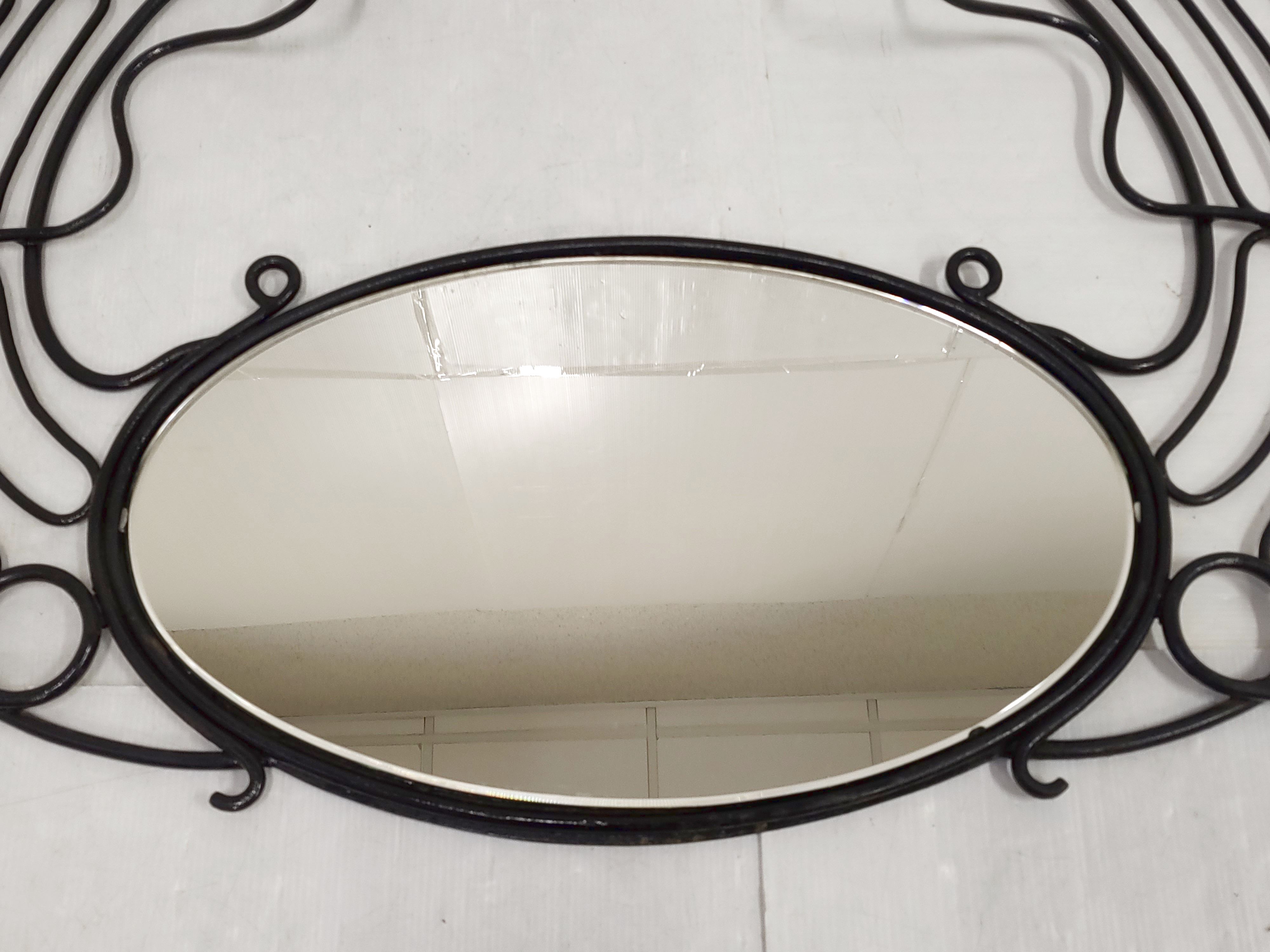 Vintage plant-bearing mirror in art nouveau style
