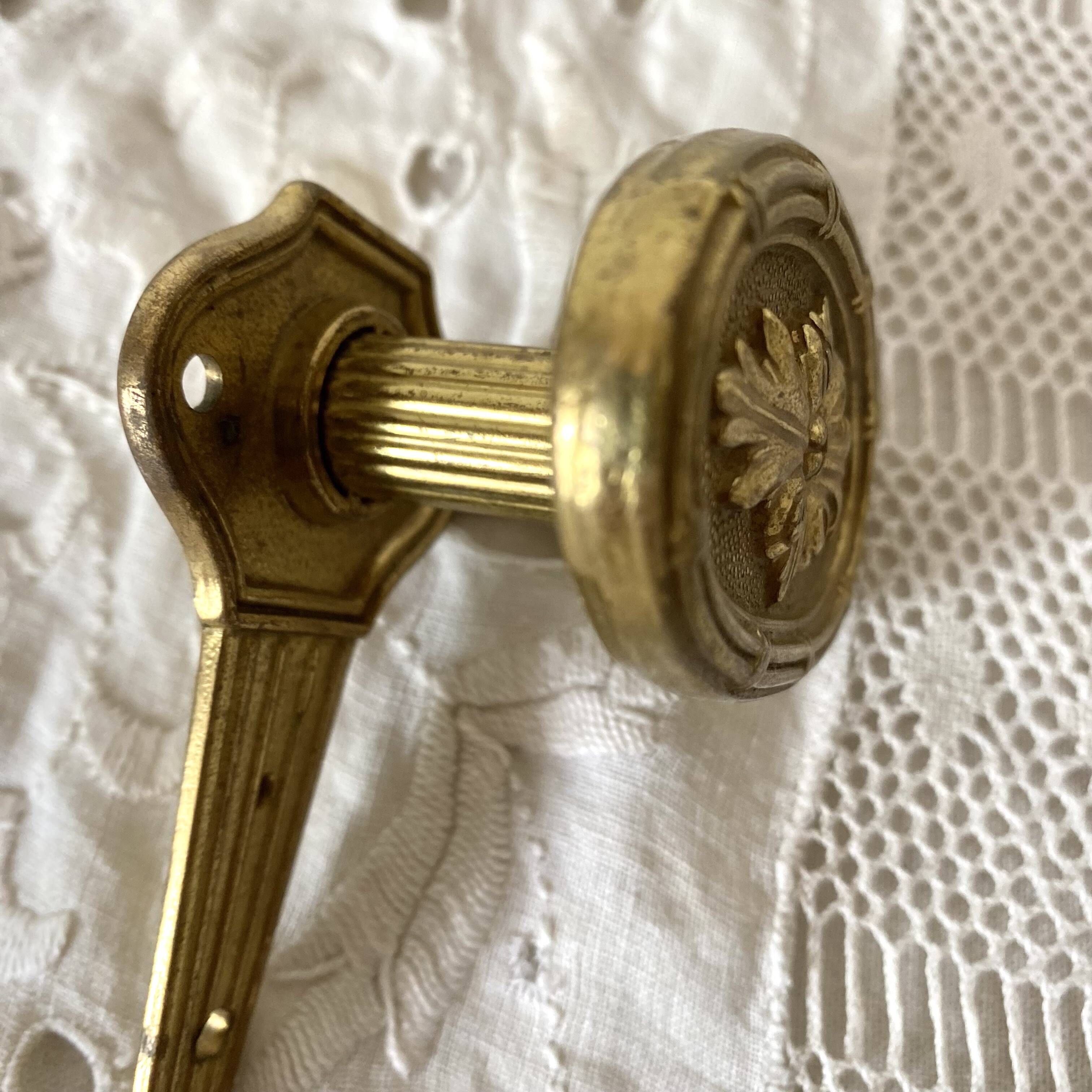 Golden brass coat hook