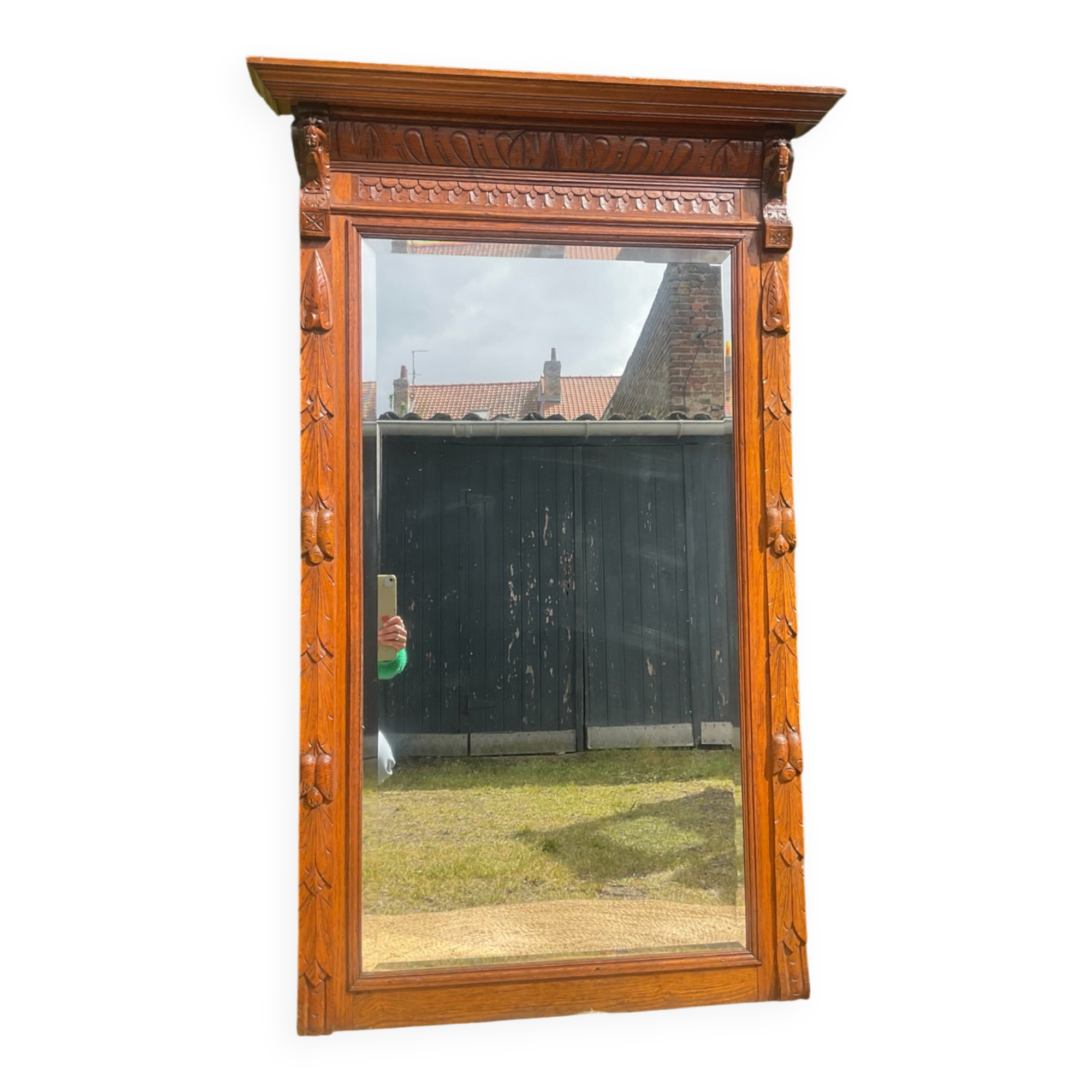 Antique large trumeau mirror in solid wood and bevelled glass.
