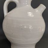 White ceramic goat-shaped creamer, first half of the 20th century.