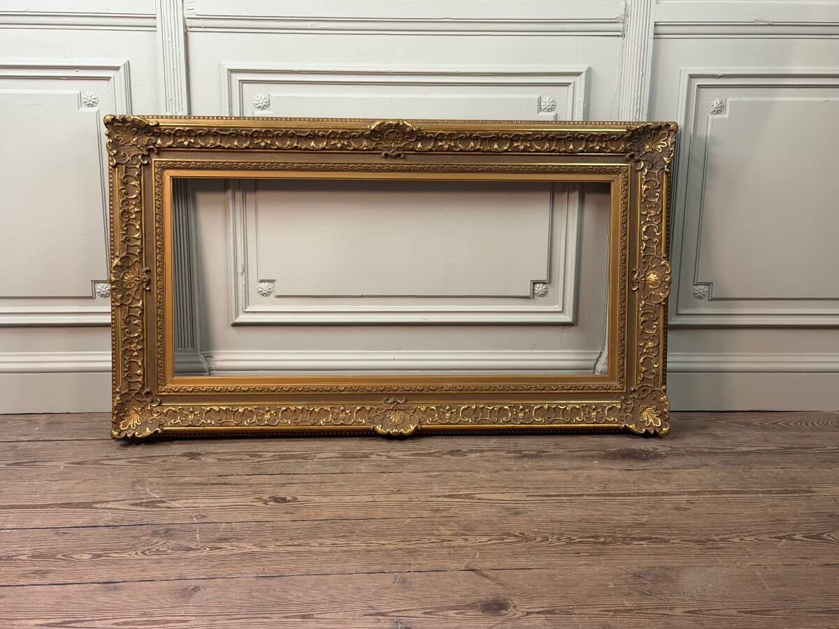 Wooden frame with stucco and gilding from around 1900